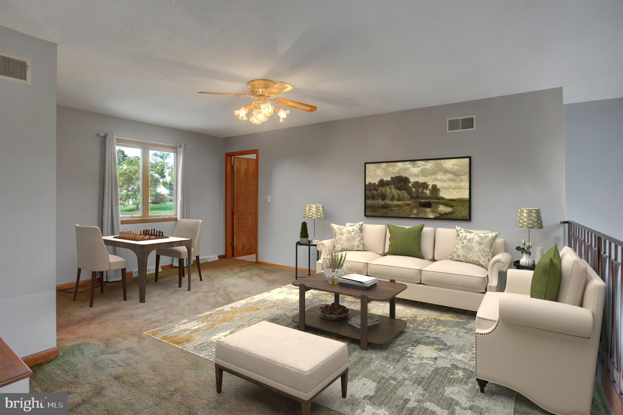 10050 McCreary Road Shippensburg, PA 17257 - Photo 36 of 64 a living room with furniture a table and a window