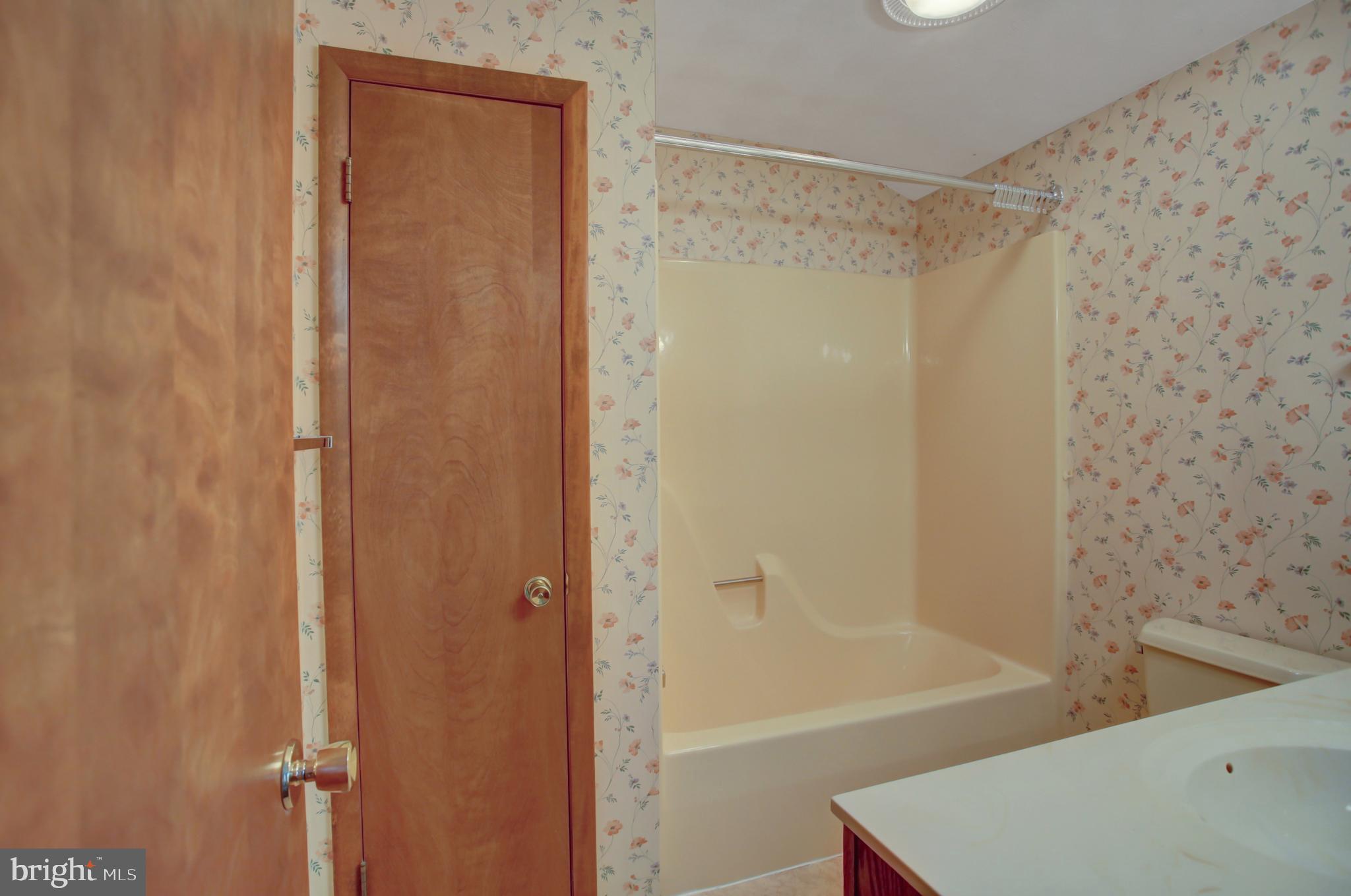 10050 McCreary Road Shippensburg, PA 17257 - Photo 44 of 64 a bathroom with a shower and a bath tub