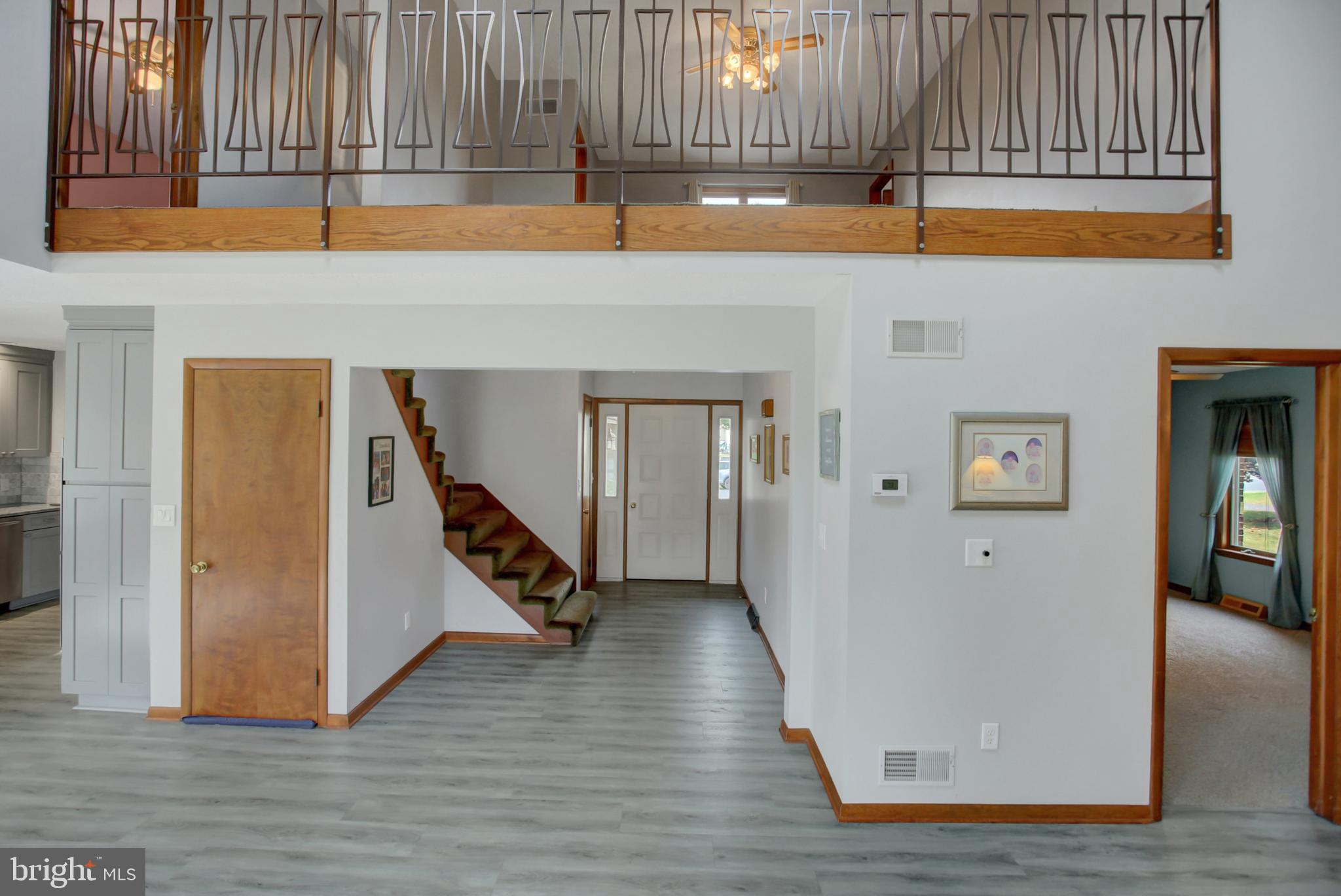 10050 McCreary Road Shippensburg, PA 17257 - Photo 6 of 64 a view of an entryway with wooden floor