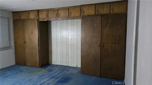 a view of front door with wooden floor