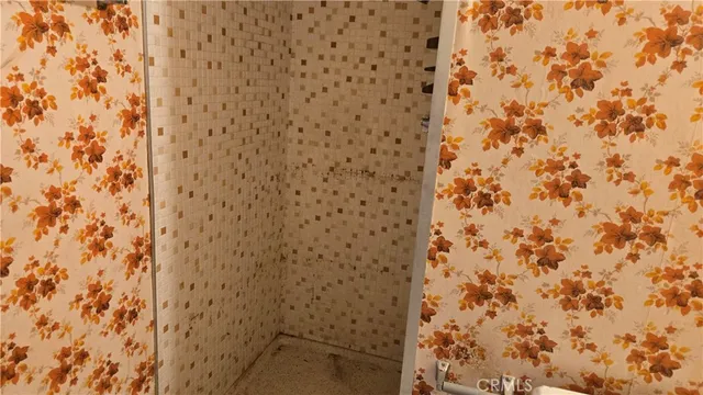 a bathroom with a shower curtain