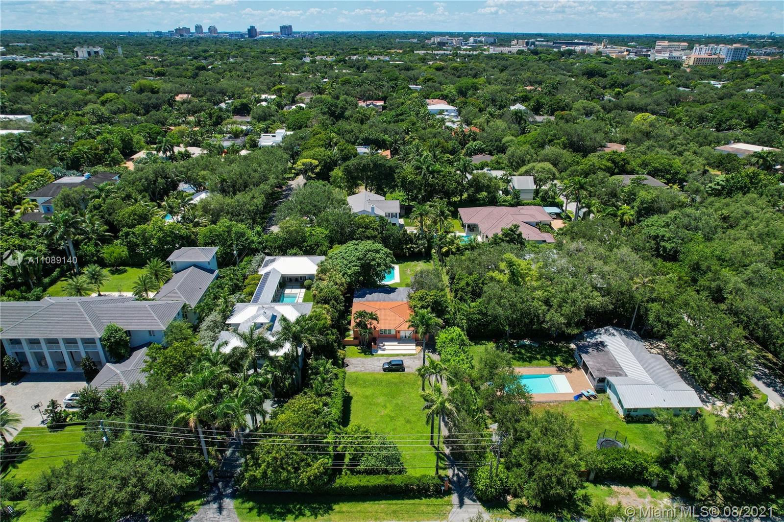 7670 Ponce De Leon Road Miami, FL 33143 - Photo 5 of 6 an aerial view of a house with a yard