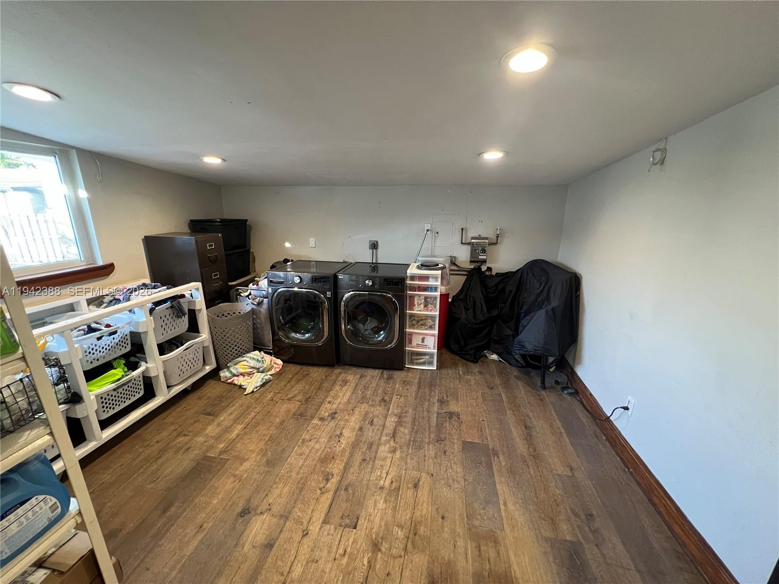 8801 Southwest 42nd Street Miami, FL 33165 - Photo 37 of 75 a living room with furniture and a flat screen tv