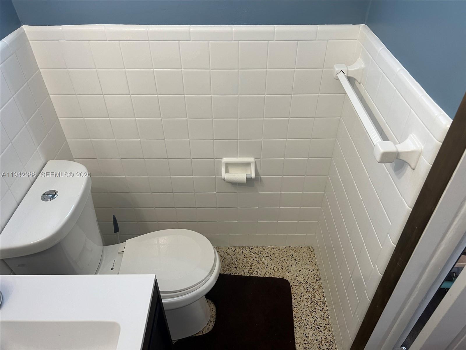 8801 Southwest 42nd Street Miami, FL 33165 - Photo 72 of 75 a bathroom with a toilet and a shower