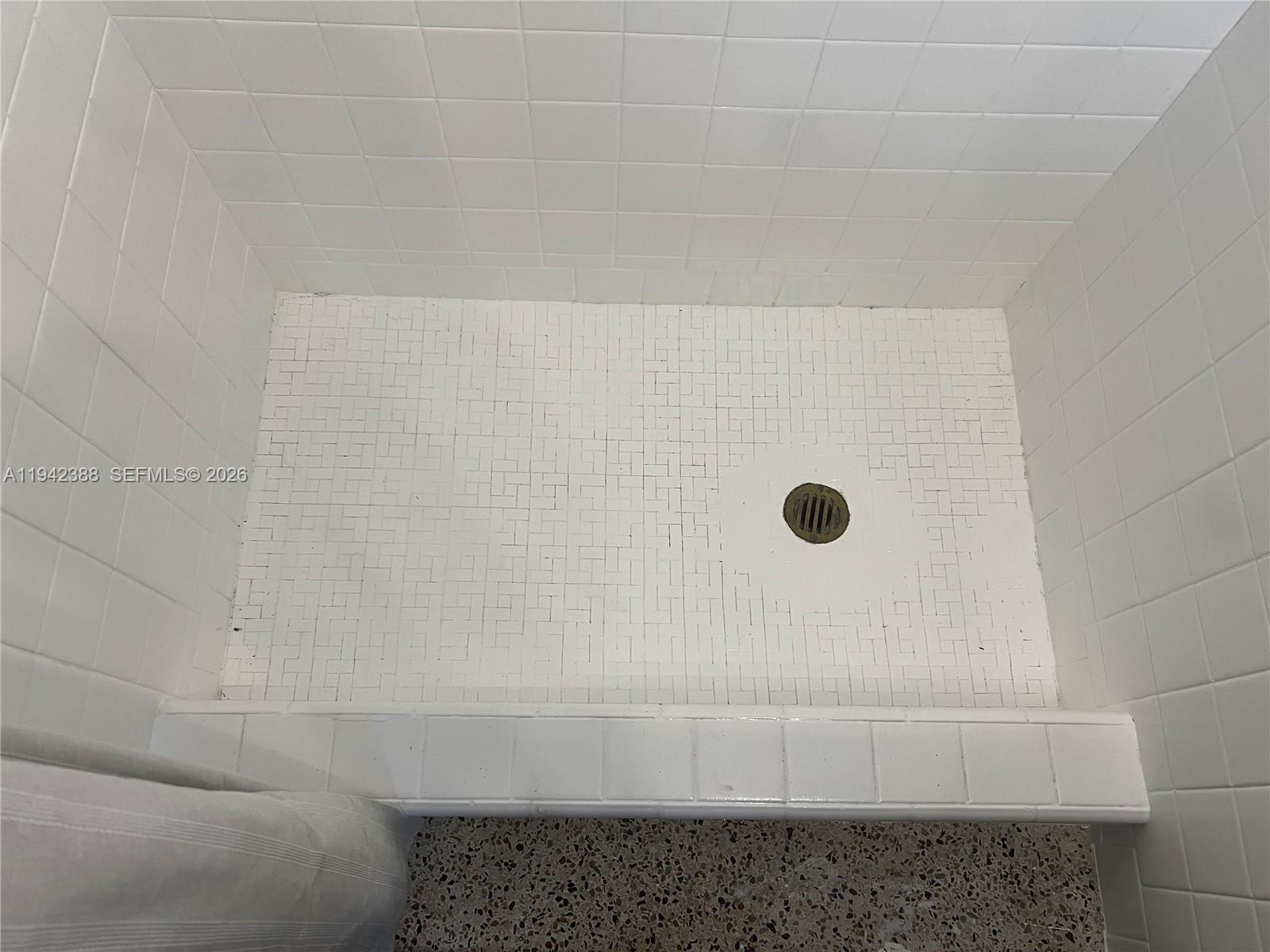 8801 Southwest 42nd Street Miami, FL 33165 - Photo 75 of 75 a bathroom with a bathtub