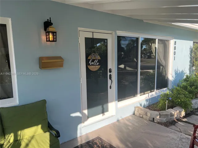 a front view of a house with a tub