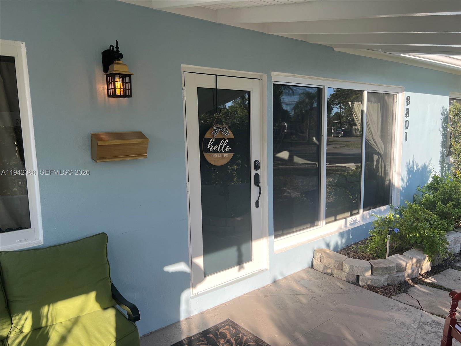 8801 Southwest 42nd Street Miami, FL 33165 - Photo 9 of 75 a living room with furniture and window