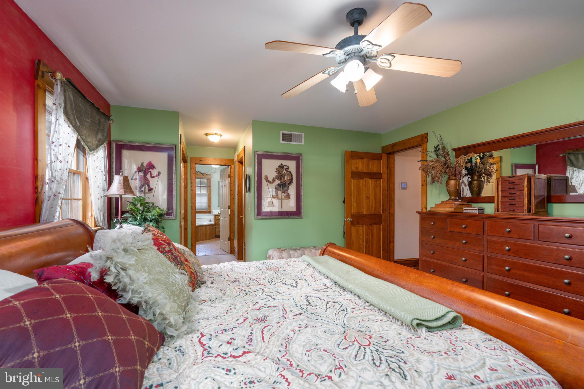 15 Phillip Drive Kirkwood, PA 17536 - Photo 25 of 52 a bedroom with a large bed and a chandelier