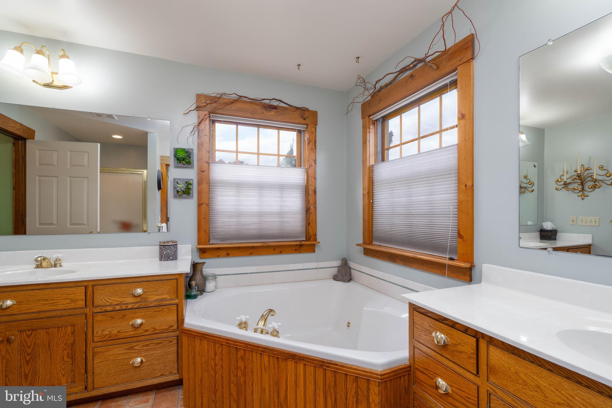 15 Phillip Drive Kirkwood, PA 17536 - Photo 26 of 52 a bathroom with a tub sink and mirror