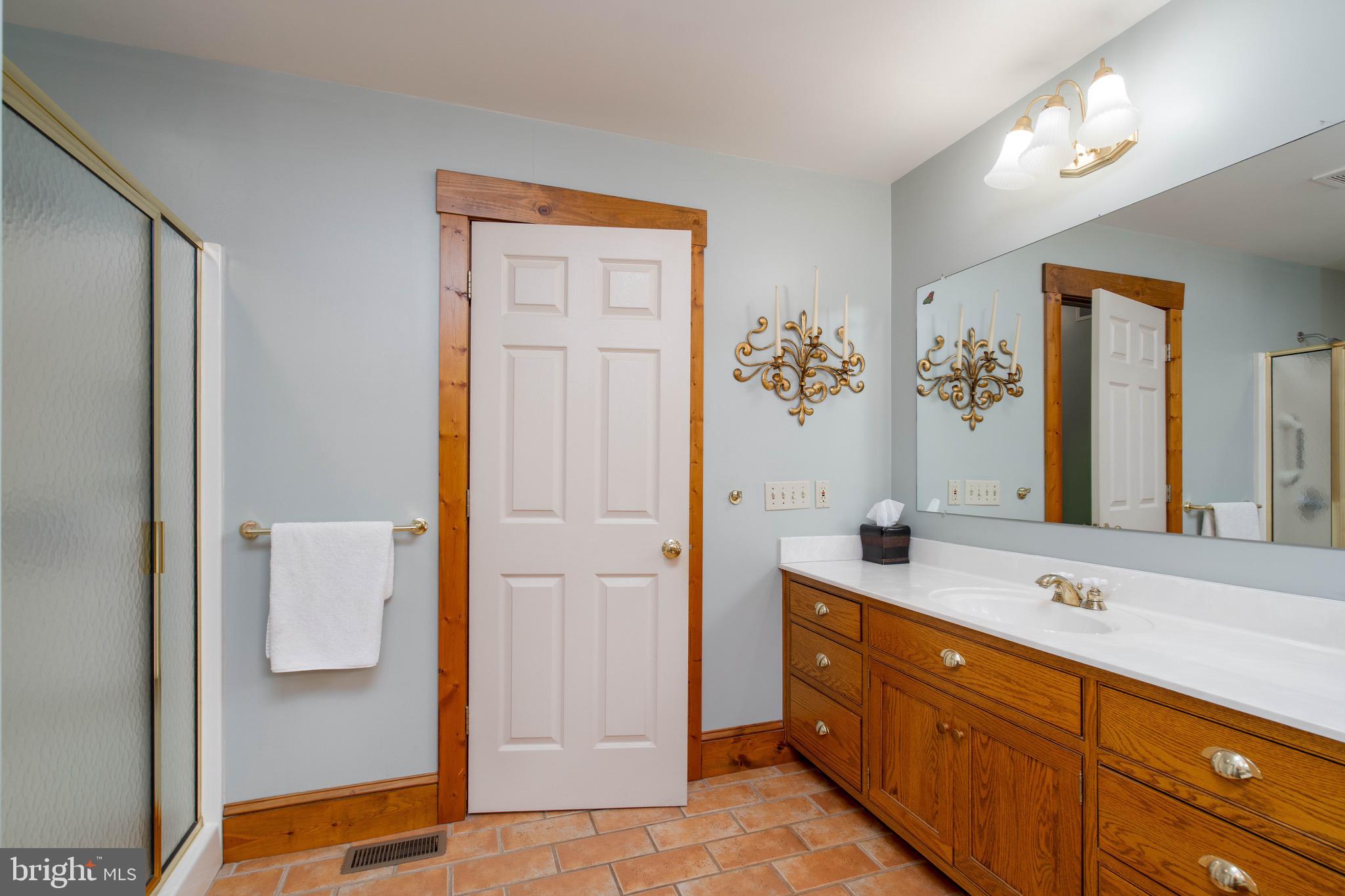 15 Phillip Drive Kirkwood, PA 17536 - Photo 27 of 52 a spacious bathroom with a double vanity sink and a mirror