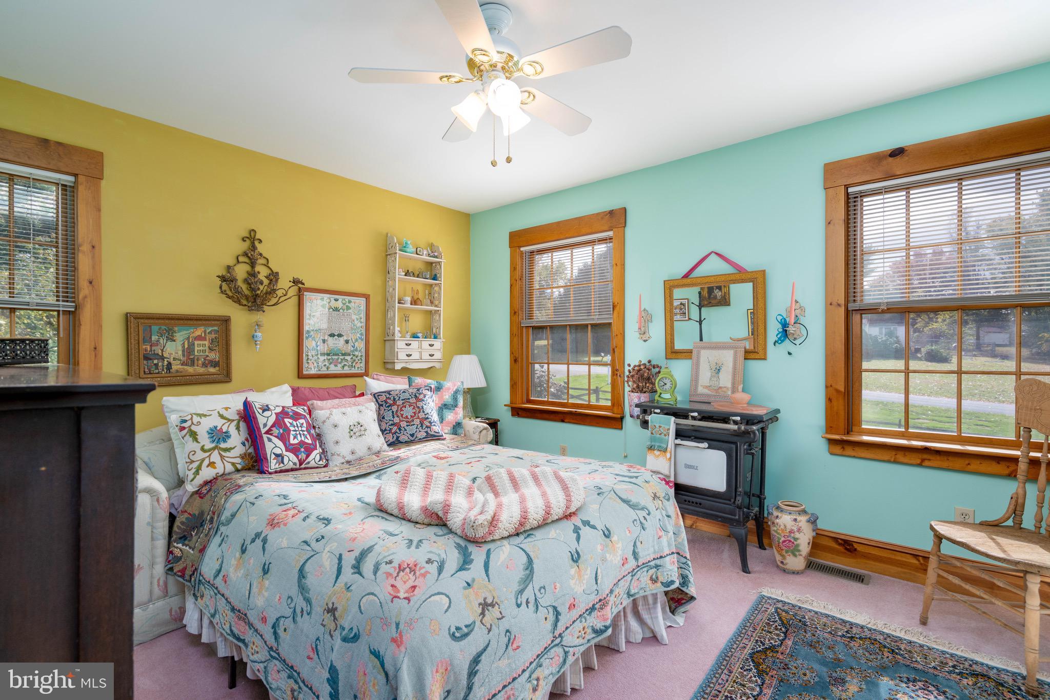 15 Phillip Drive Kirkwood, PA 17536 - Photo 32 of 52 a bedroom with a bed and a chandelier