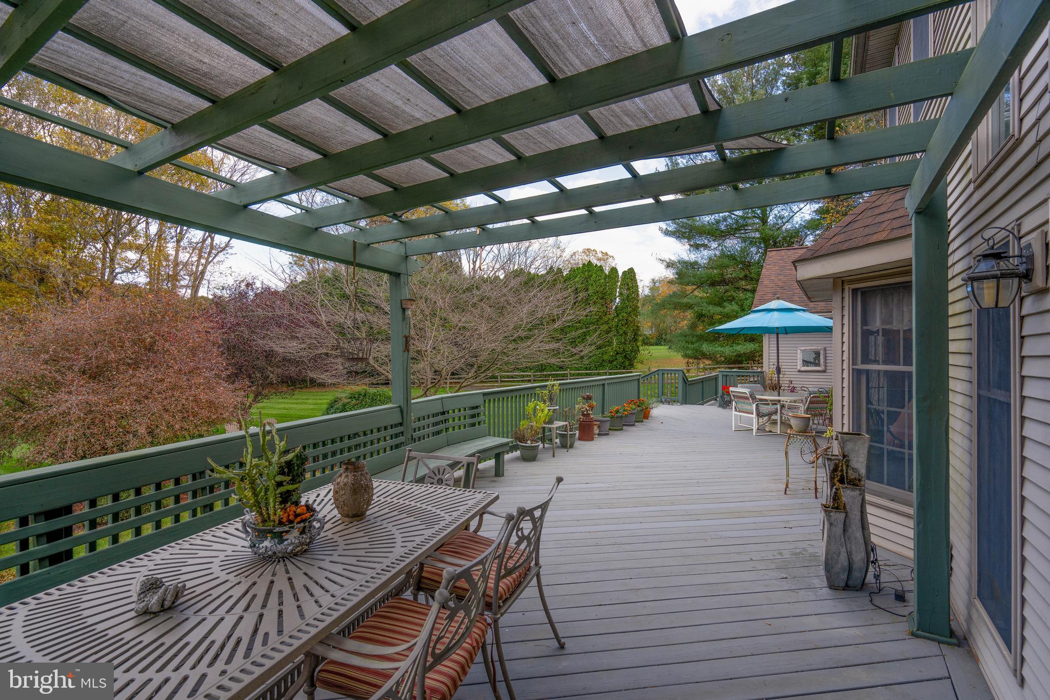 15 Phillip Drive Kirkwood, PA 17536 - Photo 42 of 52 a view of a patio with table and chairs potted plants with wooden floor