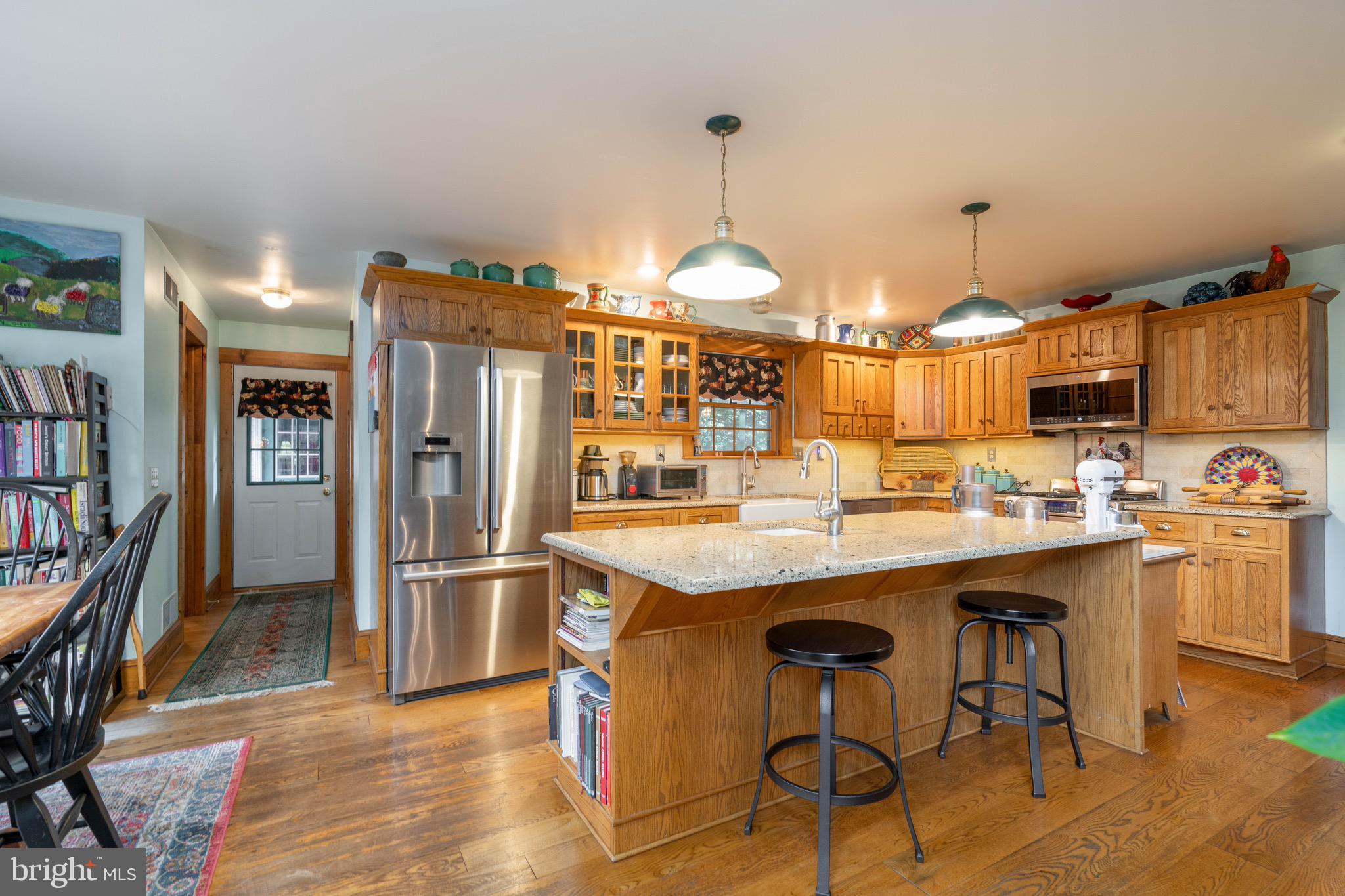 15 Phillip Drive Kirkwood, PA 17536 - Photo 9 of 52 a kitchen with stainless steel appliances granite countertop a sink a stove and a refrigerator