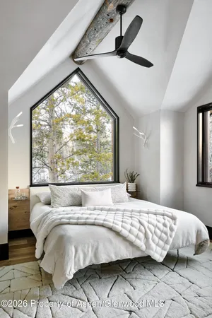 a kitchen with a sink and a stove top oven