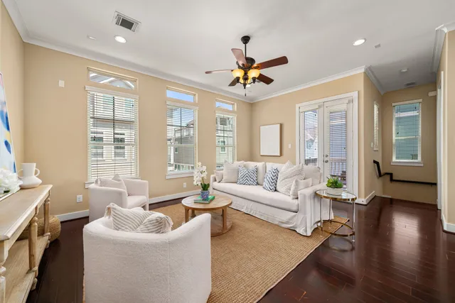 a view of a dining room with furniture wooden floor and chandelier