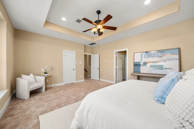 a view of a balcony with wooden floor and fence