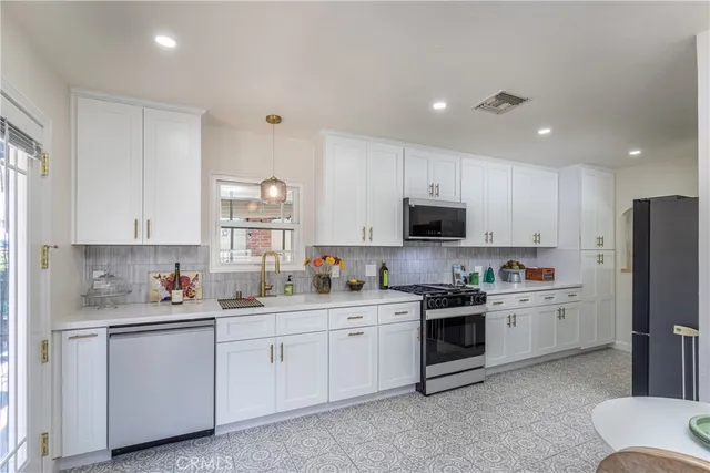 a view of a dining room with furniture