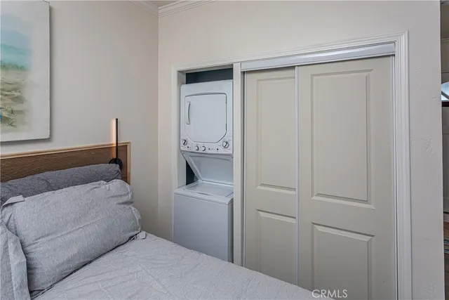 a bathroom with a sink vanity granite toilet and shower