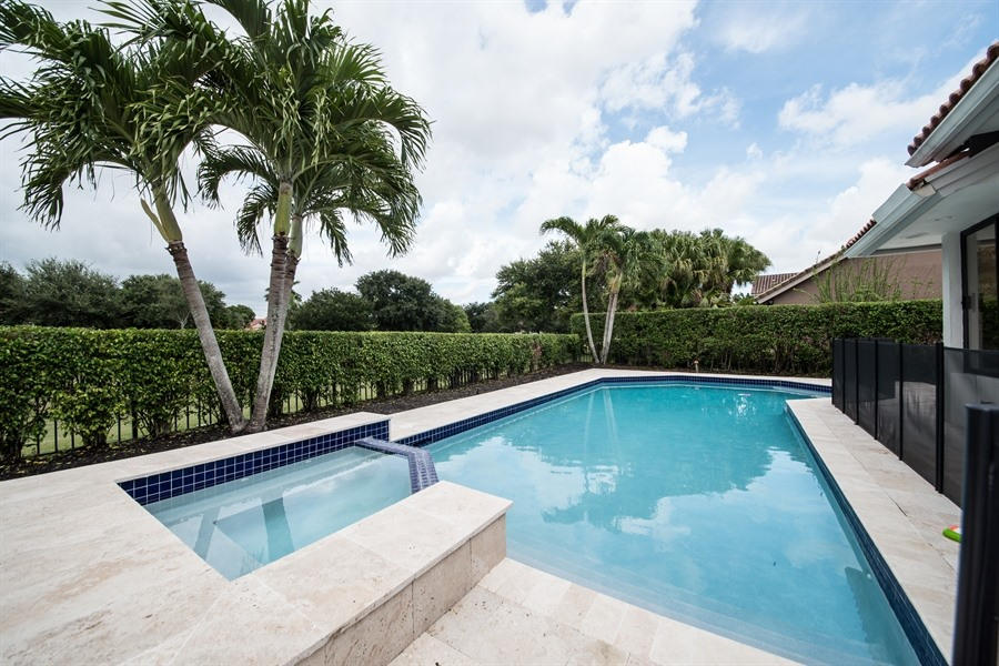 7256 Mandarin Drive Boca Raton, FL 33433 - Photo 16 of 18 16_7256MandarinDr_29_Pool_LowRes