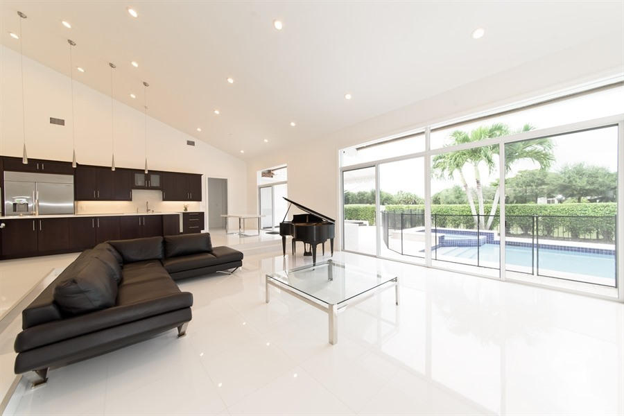 7256 Mandarin Drive Boca Raton, FL 33433 - Photo 5 of 18 05_7256MandarinDr_91_KitchenLivingRoom_L