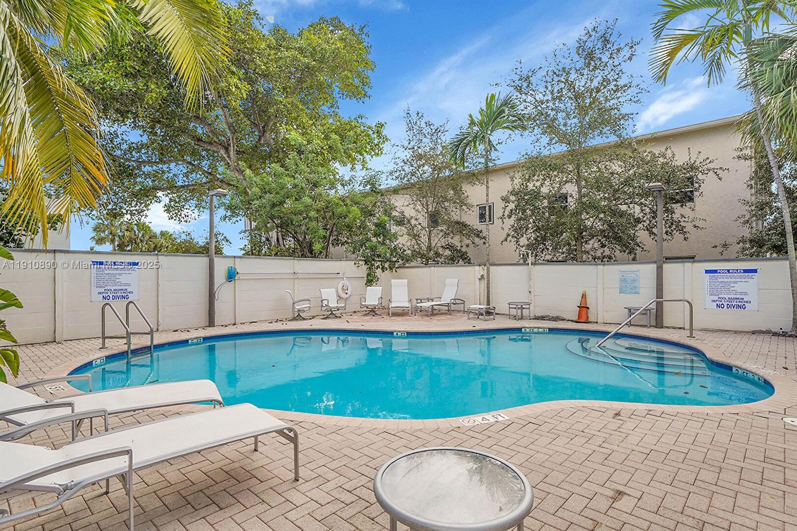 140 South E 7th Way Pompano Beach, FL 33060 - Photo 37 of 40 a view of a backyard with swimming pool