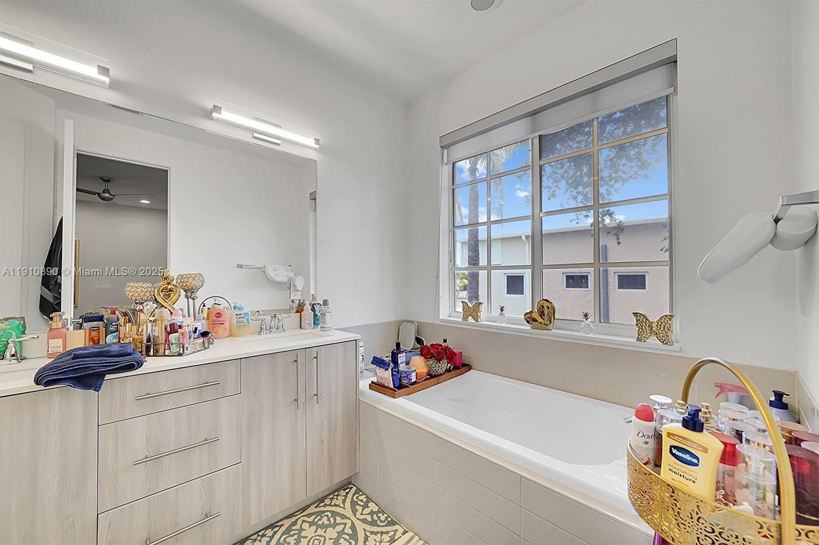 140 South E 7th Way Pompano Beach, FL 33060 - Photo 38 of 40 a very nice looking room with a large window