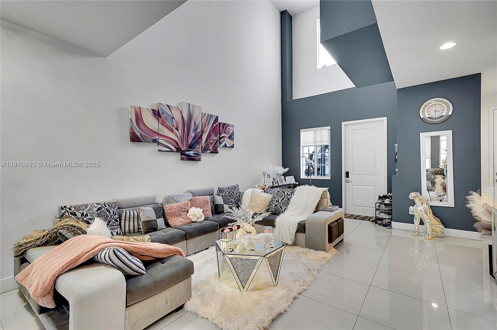 140 South E 7th Way Pompano Beach, FL 33060 - Photo 7 of 40 a living room with furniture and balcony