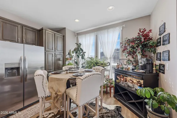 a view of a dining room with furniture window and outside view