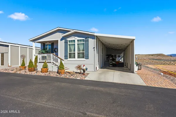 a view of a house with outdoor space and porch