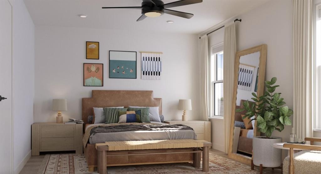 9032 Prairie Path, Unit 8806 Rowlett, TX 75089 - Photo 13 of 28 a bedroom with a bed and wooden floor