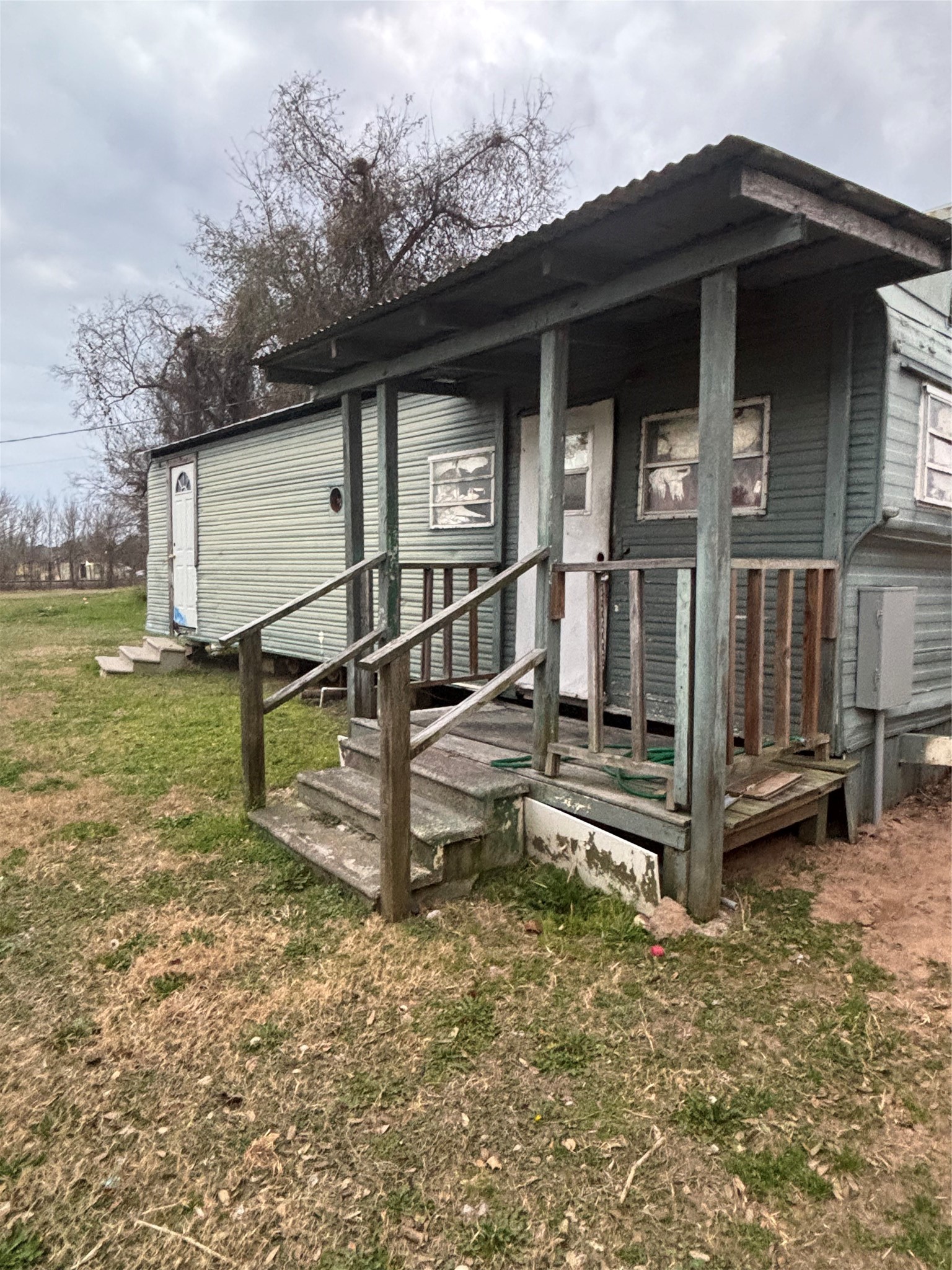 1337 3rd Street Hempstead, TX 77445 - Photo 6 of 10 a view of a house with a small yard and wooden fence