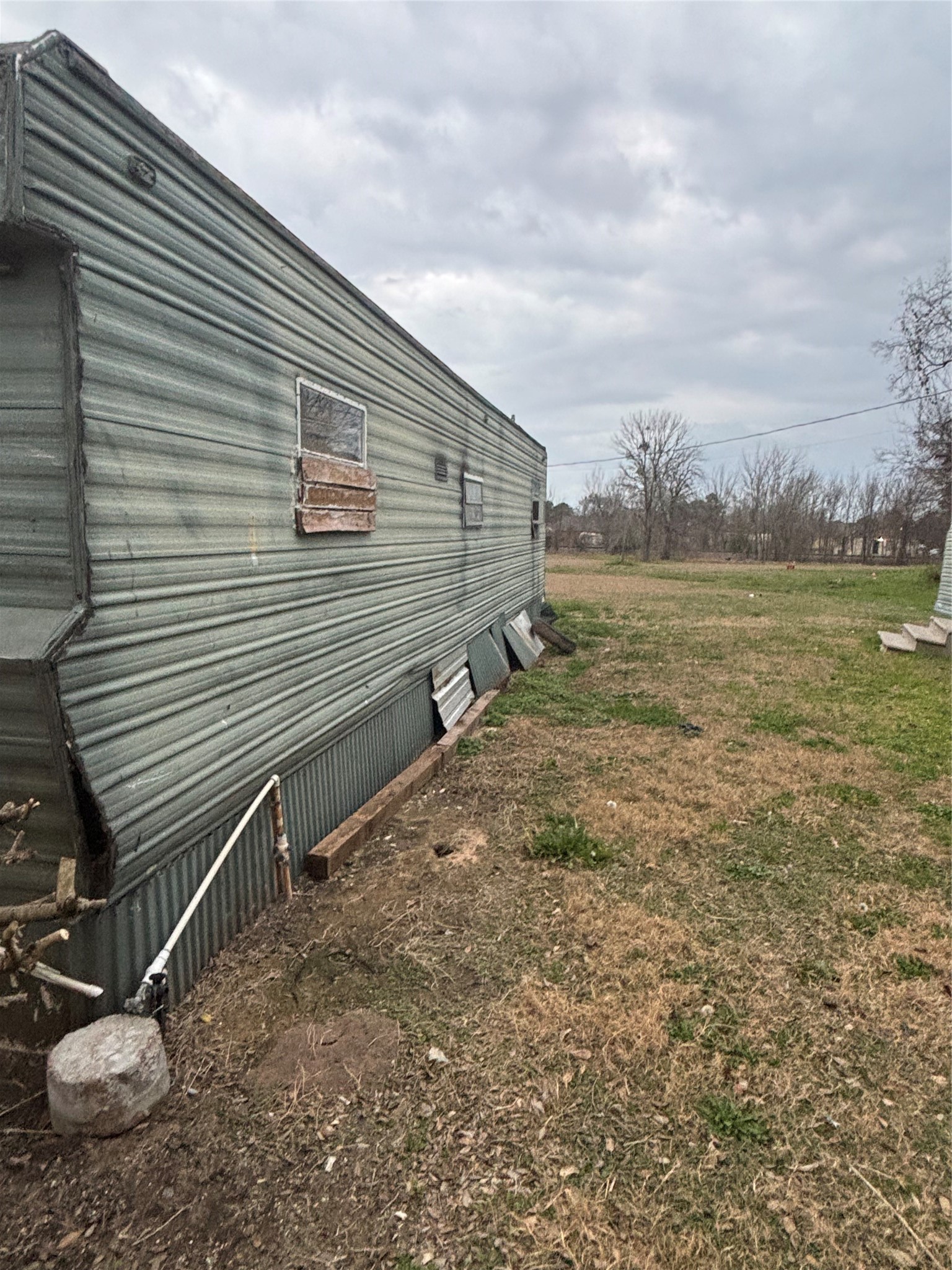 1337 3rd Street Hempstead, TX 77445 - Photo 10 of 10 a backyard of a house with lots of green space