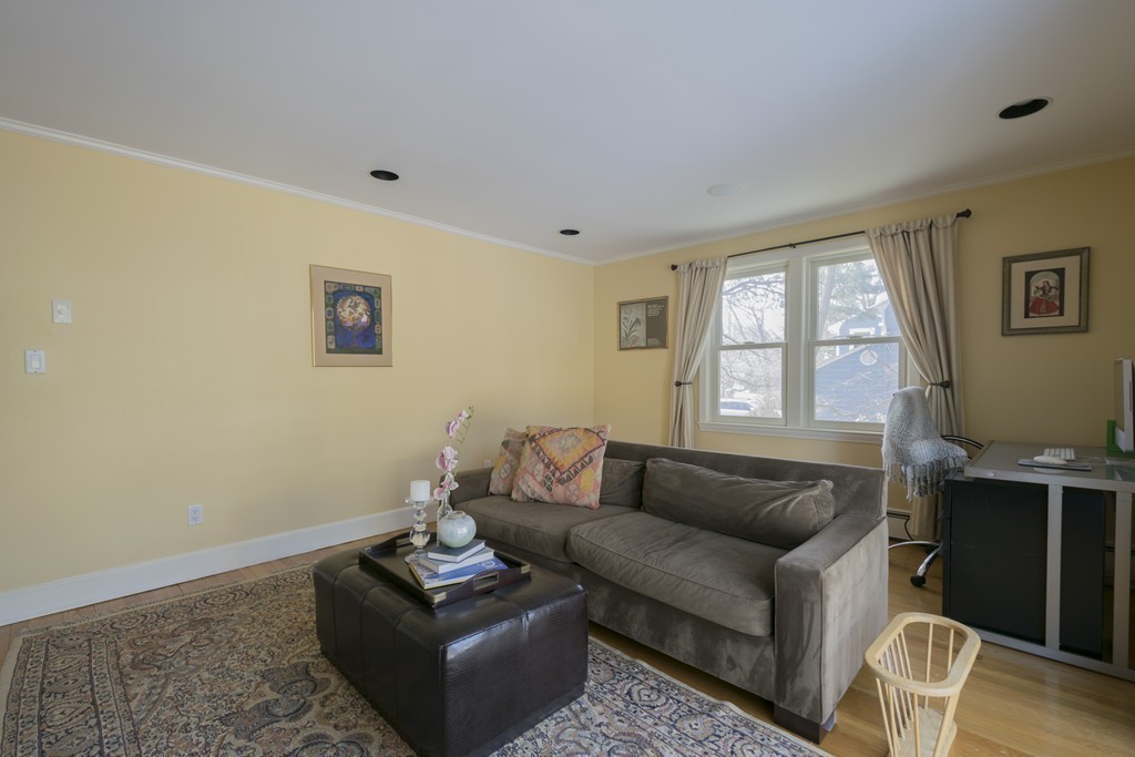 124 Kendall Road Lexington, MA 02421 - Photo 16 of 30 a living room with furniture and a window