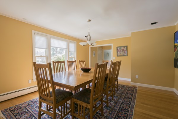 124 Kendall Road Lexington, MA 02421 - Photo 8 of 30 a view of a dining room with furniture window and wooden floor