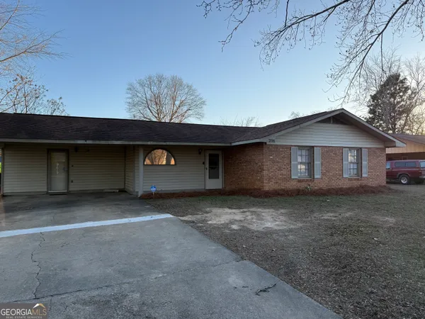 a view of a house with a garage