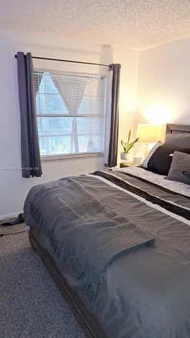 a view of balcony and backyard