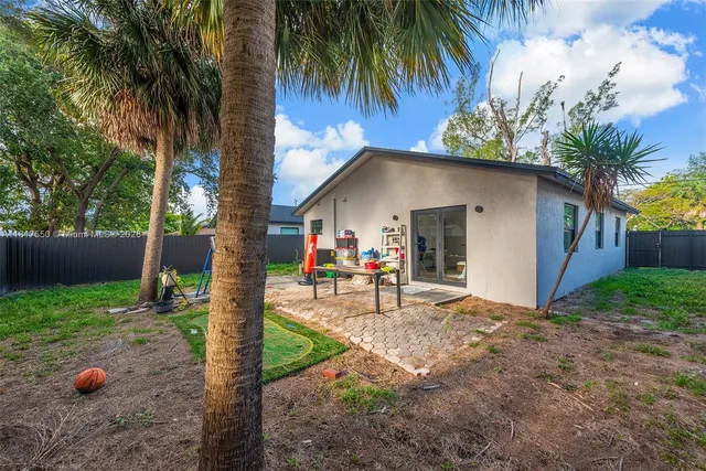 a house view with a garden space