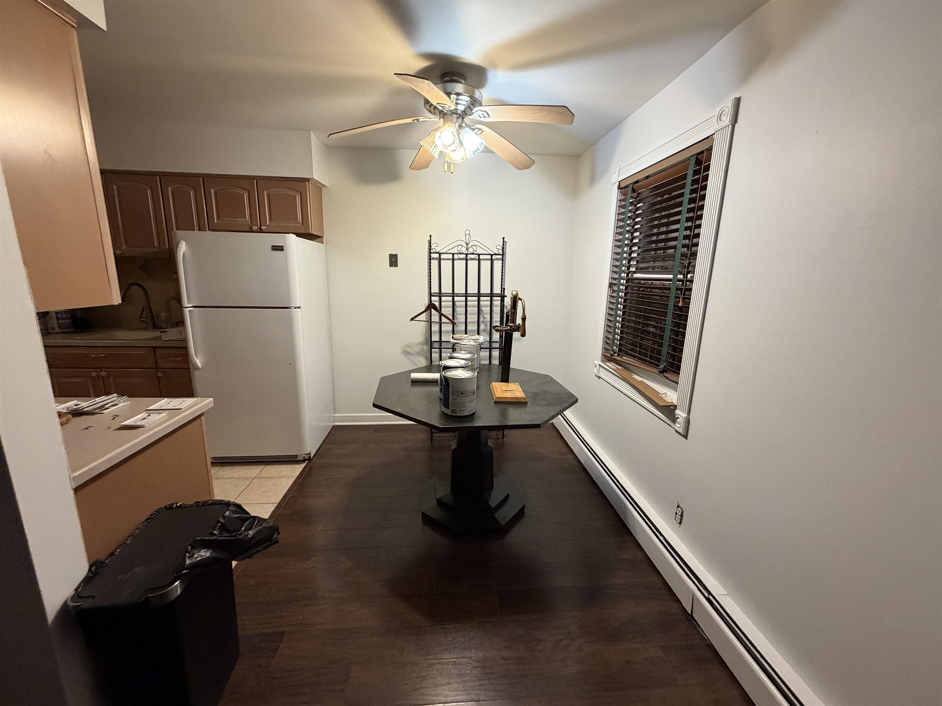 2 Radio Avenue, Unit A15 Secaucus, NJ 07094 - Photo 5 of 9 a room with furniture and a window