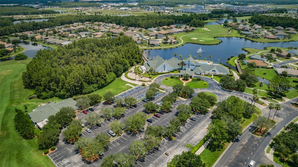 11917 Hadleigh Way Trinity, FL 34655 - Photo 75 of 84 an aerial view of a house with a lake view