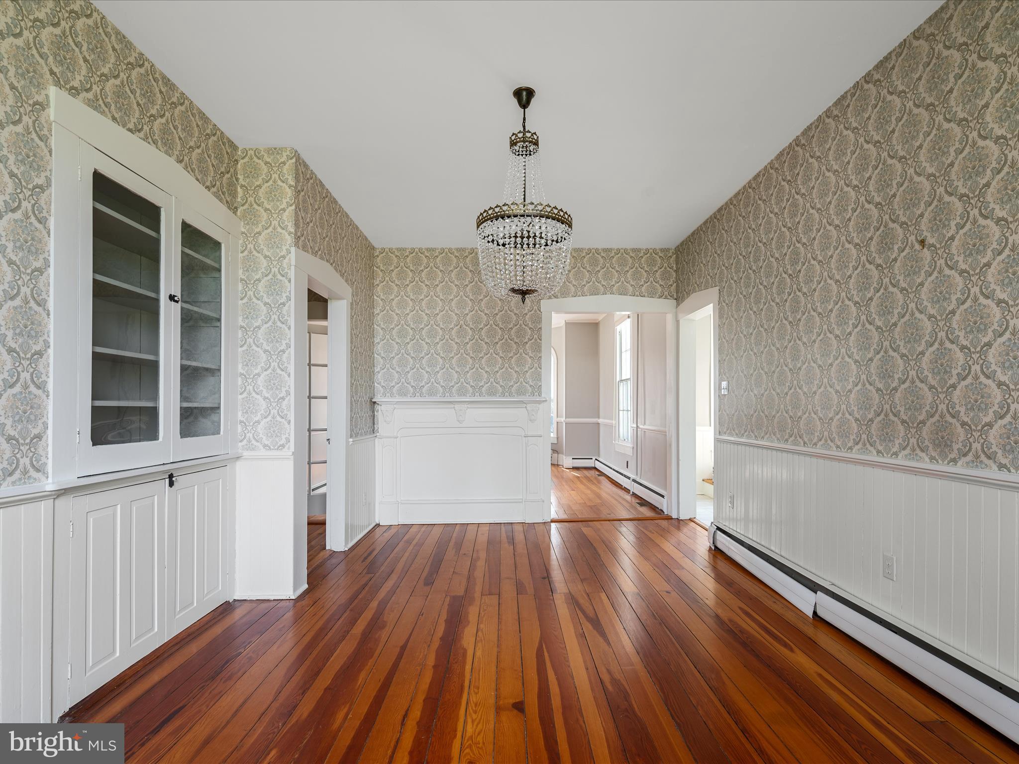 7919 Church Street Middletown, VA 22645 - Photo 15 of 48 a view of empty room with wooden floor and windows
