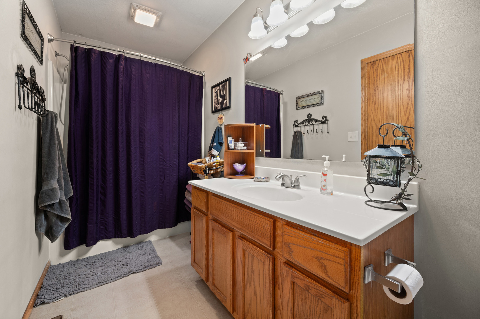 720 Hawthorne Lane Genoa, IL 60135 - Photo 11 of 25 a kitchen with a sink and cabinets