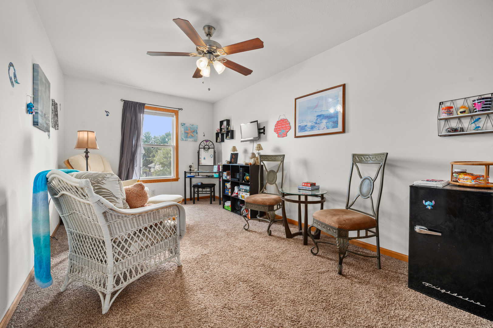 720 Hawthorne Lane Genoa, IL 60135 - Photo 13 of 25 a living room with furniture and a wooden floor