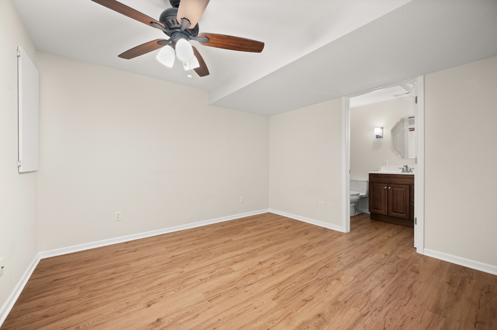 720 Hawthorne Lane Genoa, IL 60135 - Photo 19 of 25 wooden floor in an empty room with a window