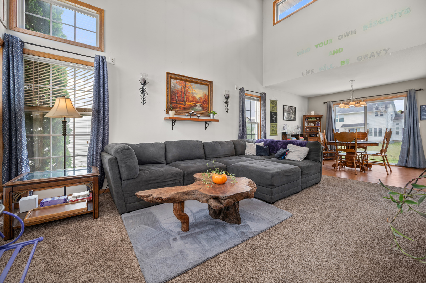 720 Hawthorne Lane Genoa, IL 60135 - Photo 4 of 25 a living room with furniture and a window