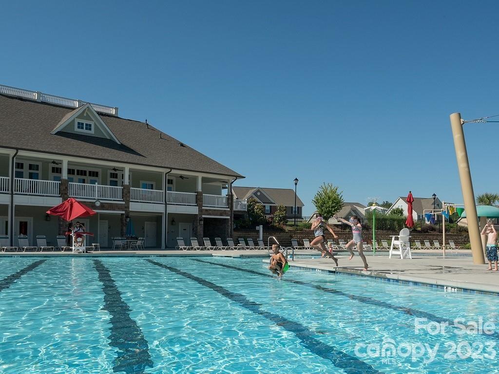 6587 Gopher Road, Unit 343 Lancaster, SC 29720 - Photo 17 of 19 a view of a park with swings and slides