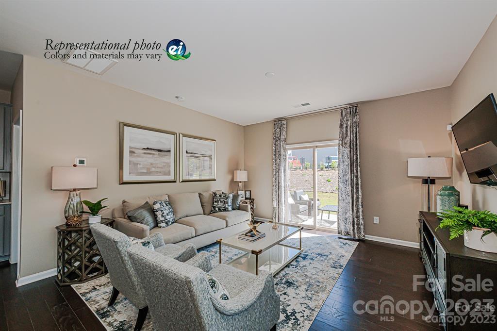 6587 Gopher Road, Unit 343 Lancaster, SC 29720 - Photo 5 of 19 a living room with furniture and wooden floor