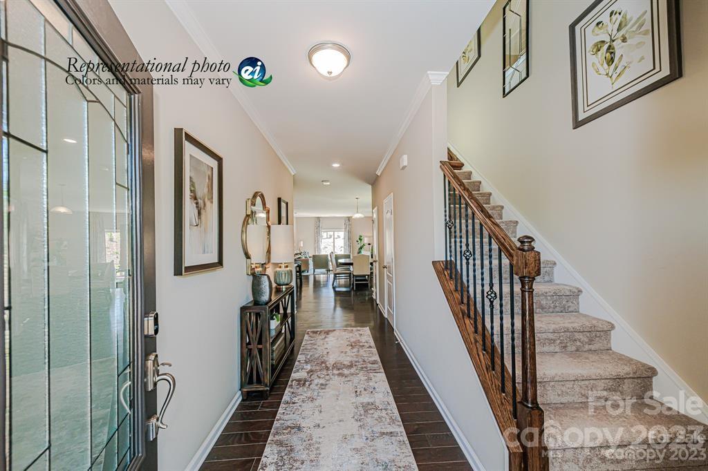 6587 Gopher Road, Unit 343 Lancaster, SC 29720 - Photo 6 of 19 a view of a hallway with wooden floor