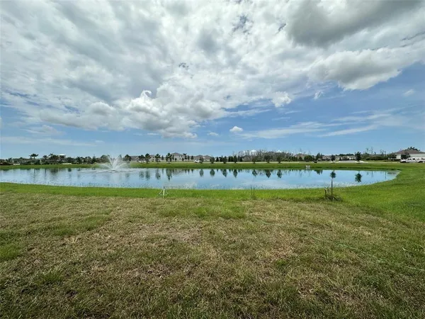 a view of a city with green space