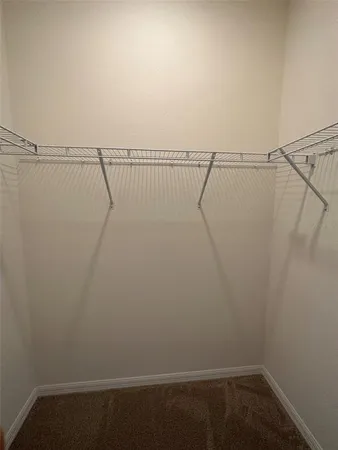 a view of small space with racks on the wall