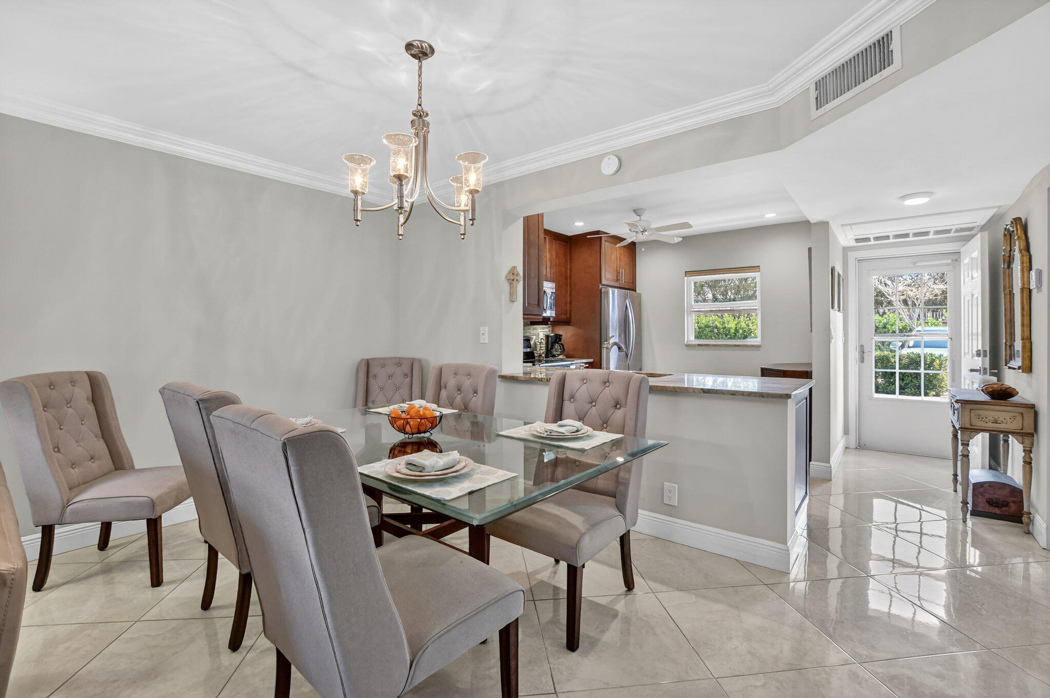 250 Northeast 20th Street, Unit 1170 Boca Raton, FL 33431 - Photo 12 of 40 a view of a dining room with furniture window and outside view